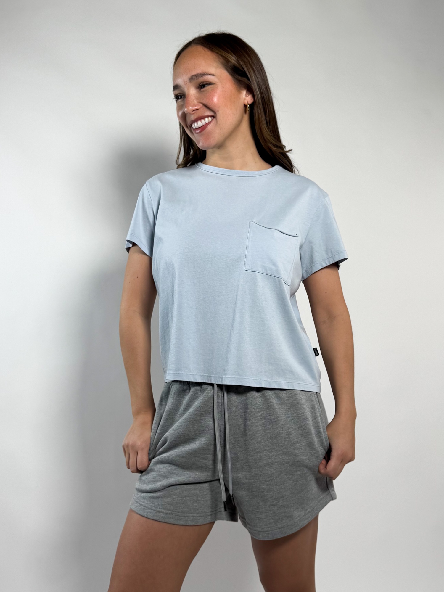 Remera con bolsillo Caro 